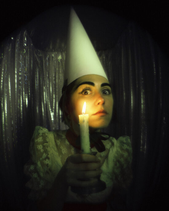 caprices girl holding candle